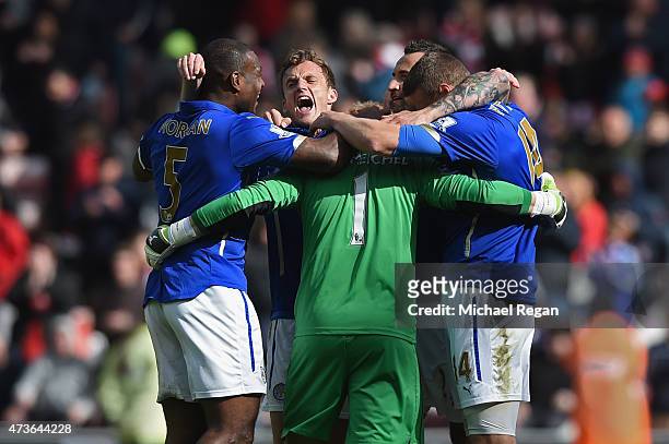 Wes Morgan, Kasper Schmeichel, Andy King, Marcin Wasilewski and Robert Huth of leicester celebrate on the final whistle during the Barclays Premier...