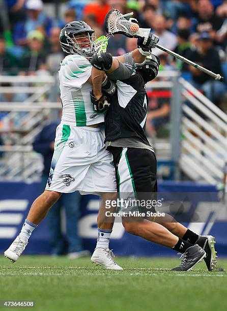 Michael Evans of the Chesapeake Bayhawks and John Austin of the New York Lizards battle for the ball at James M. Shuart Stadium on May 16, 2015 in...