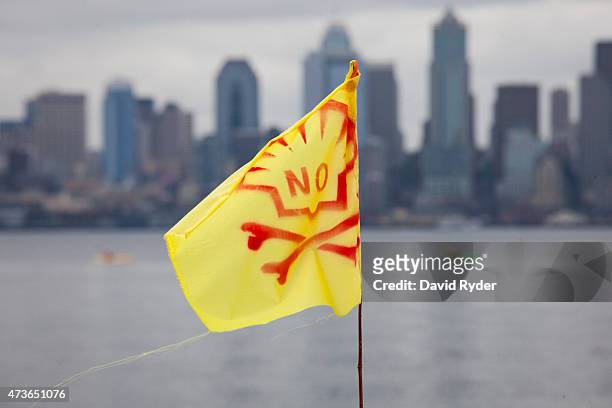 ShellNo flag flies during a ShellNo flotilla demonstration against Royal Dutch Shell on the waters of Puget Sound on May 16, 2015 in Seattle,...