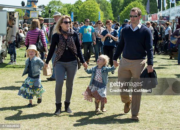 Peter Phillips and Autumn Phillips with Isla Phillips and Savannah Phillips at the Royal Windsor Horse show in the private grounds of Windsor Castle...