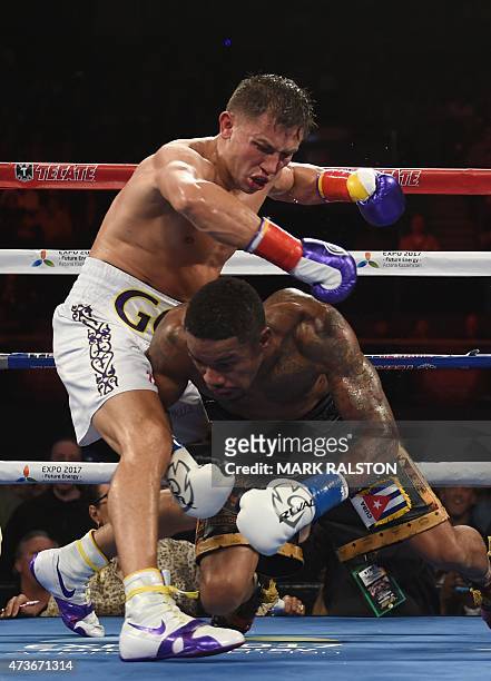 Boxer Gennady Golovkin from Kazakhstan knocks out Willie Monroe Jr. Of the US in the sixth round during their Middleweight World Championship bout at...