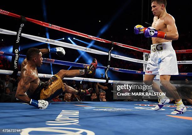 Boxer Gennady Golovkin from Kazakhstan knocks down Willie Monroe Jr. Of the US in the second round before finally knocking him out in the sixth round...