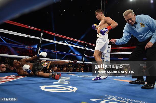 Boxer Gennady Golovkin from Kazakhstan knocks down Willie Monroe Jr. Of the US in the second round before finally knocking him out in the sixth round...