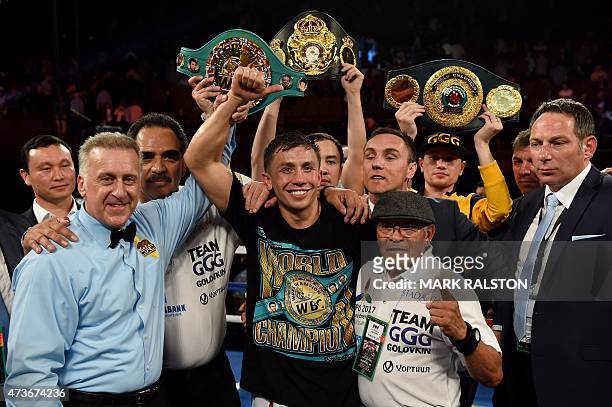 Boxer Gennady Golovkin from Kazakhstan celebrates after knocking out Willie Monroe Jr. Of the US in the sixth round during their Middleweight World...