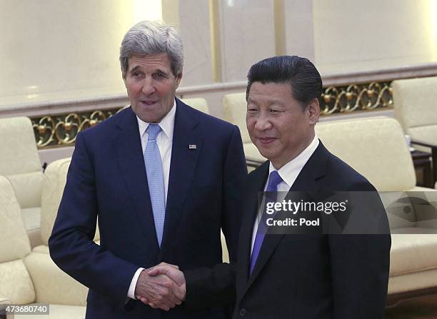 Secretary of State John Kerry shakes hands with Chinese President Xi Jinping at the Great Hall of the People on May 17, 2015 in Beijing, China. U.S....