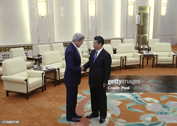 Secretary of State John Kerry shakes hands with Chinese President Xi Jinping at the Great Hall of the People on May 17, 2015 in Beijing, China. U.S....