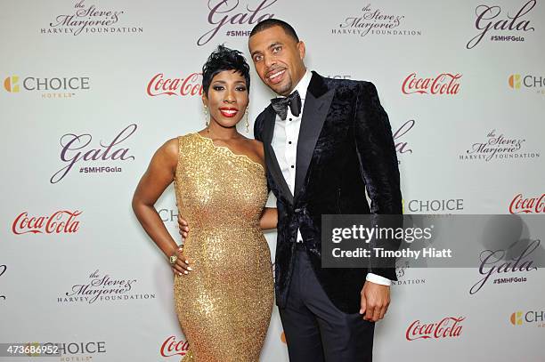 Karli Harvey and Benjamin Raymond attend the Steve & Marjorie Harvey Foundation Gala on May 16, 2015 in Chicago, Illinois.