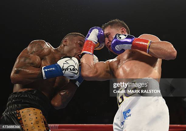 Boxer Gennady Golovkin from Kazakhstan lands a punch on Willie Monroe Jr. Of the US in the second round during their Middleweight World Championship...