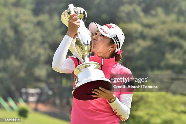 Bo-Mee Lee of South Korea poses with the trophy after winning the Hoken-no-Madoguchi Ladies at the Fukuoka Country Club Ishino Course on May 17, 2015...