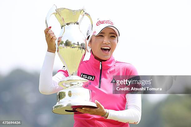 Bo-Mee Lee of South Korea poses with the trophy after winning the Hoken-no-Madoguchi Ladies at the Fukuoka Country Club Ishino Course on May 17, 2015...