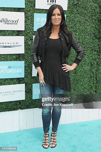 Patti Stanger arrives at the Ovarian Cancer Research Fund's 2nd Annual Super Saturday LA at Barker Hangar on May 16, 2015 in Santa Monica, California.