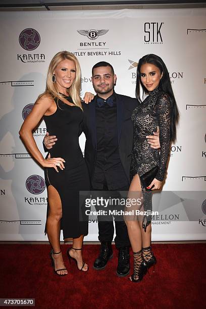 Reality TV actress Gretchen Rossi; Fashion Designer Michael Costello and Reality TV actress Lilly Ghalichi arrive at Karma International's Black &...