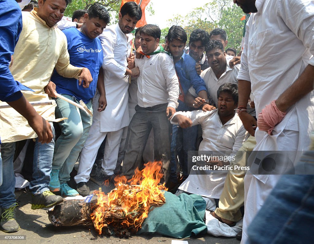 Activist Of Youth Congress  burn an effigy at Shastri Bhawan...