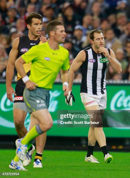 Travis Cloke of the Magpies reacts after an umpire made a decision during the round seven AFL match between the Richmond Tigers and the Collingwood...