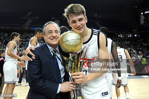 Florentino Perez, President of Real Madrid celebrates with Luka Doncic, #17 of Real Madrid the winner of Adidas Next Generation Tournament Final Game...