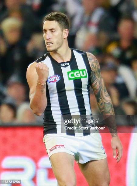Jesse White of the Magpies celebrates after kicking a goal during the round seven AFL match between the Richmond Tigers and the Collingwood Magpies...