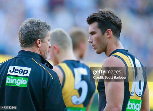 Damien Hardwick, coach of the Tigers talks with Alex Rance during the round seven AFL match between the Richmond Tigers and the Collingwood Magpies...