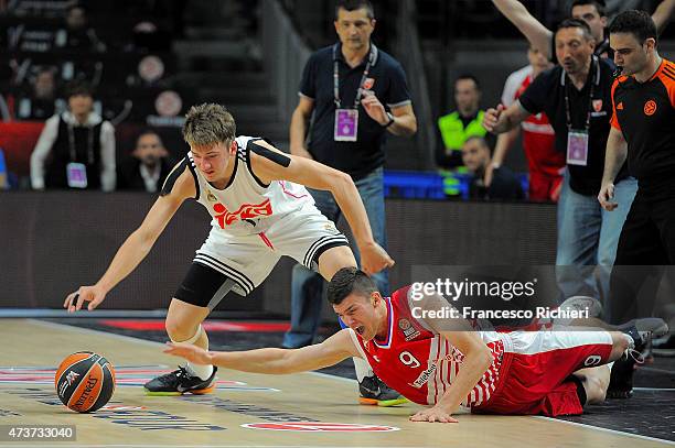 Vojislav Stojanovic, #9 of crvena Zvedza and Luka Doncic, #17 of Real Madrid competes during the Adidas Next Generation Tournament Final Game between...