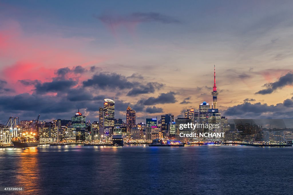 Auckland city with dramatic sunset sky