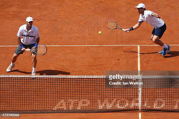 Pablo Cuevas of Argentina and David Marrero of Spain in action during their Men's Doubles Final match against Marcel Granollers and Marc López of...