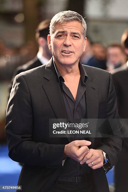 Actor George Clooney poses on the carpet arriving to attend the European premiere of the film 'Tomorrowland: A World Beyond' in London on May 17,...