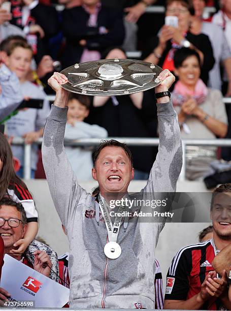 Ralph Hasenhuettl Head Coach of FC Ingolstadt celebrates with the shield after victory in the 2. Bundesliga match between FC Ingolstadt and RB...