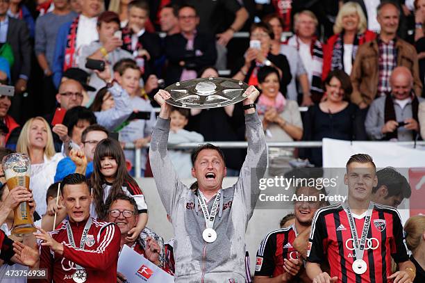 Ralph Hasenhuettl Head Coach of FC Ingolstadt celebrates with the shield after victory in the 2. Bundesliga match between FC Ingolstadt and RB...