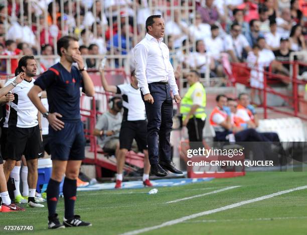 Almeria's coach Sergi BarJuan jumps in the air during the Spanish league football match Sevilla FC vs UD Almeria at the Ramon Sanchez Pizjuan stadium...