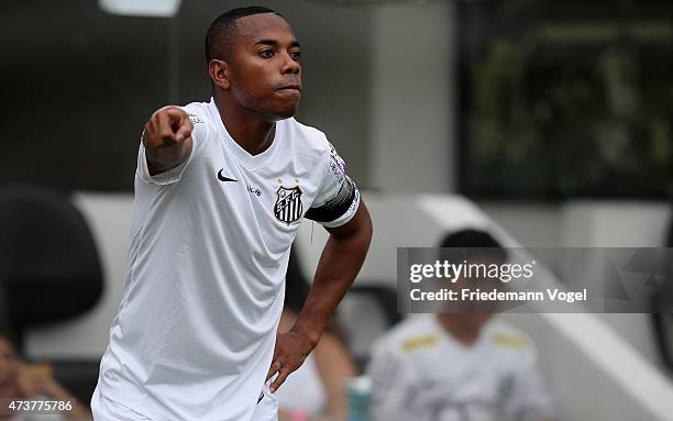 Robinho of Santos reacts during the match between Santos and Cruzeiro for the Brazilian Series A 2015 at Vila Belmiro Stadium on May 17, 2015 in...