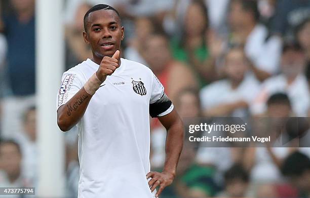 Robinho of Santos reacts during the match between Santos and Cruzeiro for the Brazilian Series A 2015 at Vila Belmiro Stadium on May 17, 2015 in...