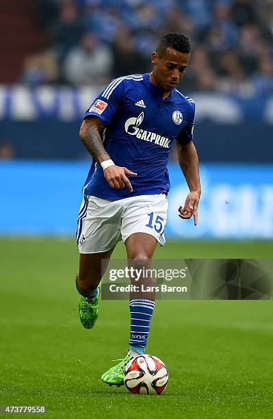Dennis Aogo of Schalke 04 runs with the ball during the Bundesliga match between FC Schalke 04 and SC Paderborn at Veltins Arena on May 16, 2015 in...