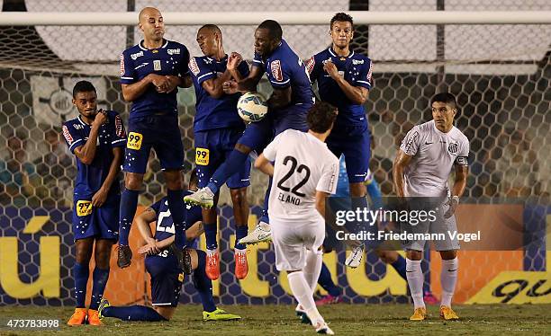 Players of Cruzeiro jumps in the wall during a free kick of Elano of Santos during the match between Santos and Cruzeiro for the Brazilian Series A...