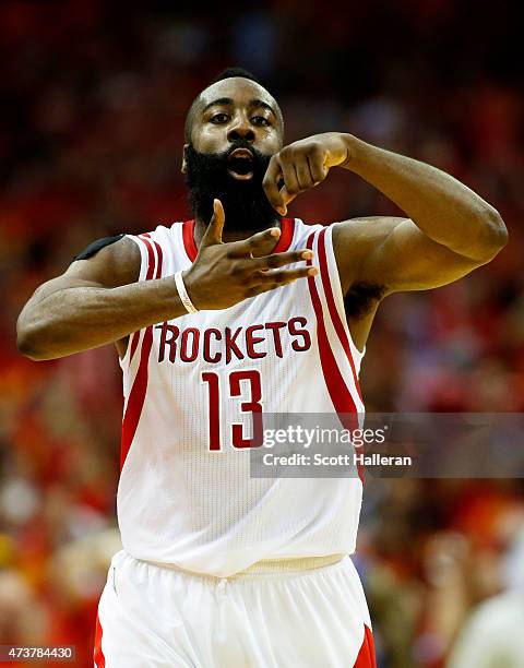 James Harden of the Houston Rockets celebrates in the fourth quarter against the Los Angeles Clippers during Game Seven of the Western Conference...