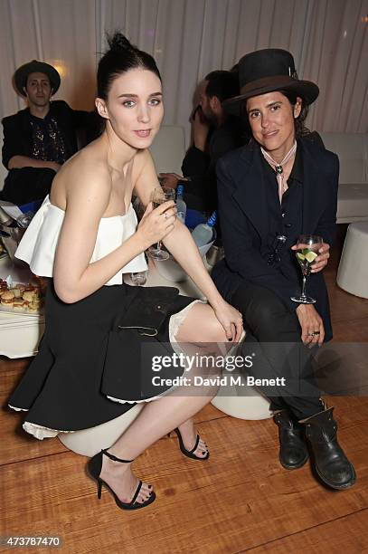 Rooney Mara and Francesca Gregorini attend the "Carol" party hosted by Chopard and Grey Goose at Baoli Beach, Cannes Film Festival on May 17, 2015 in...