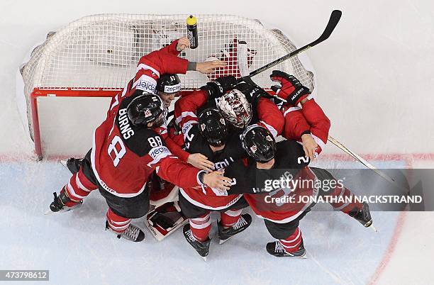 Players of team Canada celebrate after winning the gold medal match Canada vs Russia at the 2015 IIHF Ice Hockey World Championships on May 17, 2015...