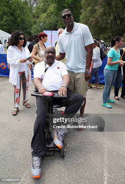 Former NBA Players Cal Ramsey and Larry Johnson attend A Sunday Afternoon In Harlem Presented By Aetna during the Harlem EatUp! Festival on May 17,...