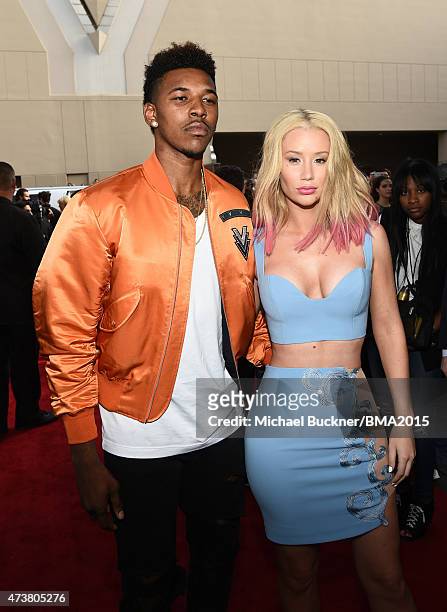 Player Nick Young and recording artist Iggy Azalea attend the 2015 Billboard Music Awards at MGM Grand Garden Arena on May 17, 2015 in Las Vegas,...
