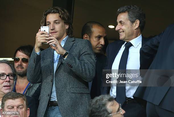 Jean Sarkozy and his father, former French President Nicolas Sarkozy attend the French Ligue 1 match between Montpellier Herault SC and Paris...