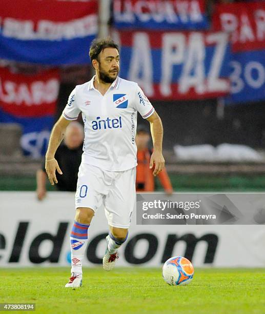 Álvaro Recoba of Nacional drives the ball during a match between Peñarol and Nacional as part of 12th round of Torneo Clausura 2015 at Centenario...