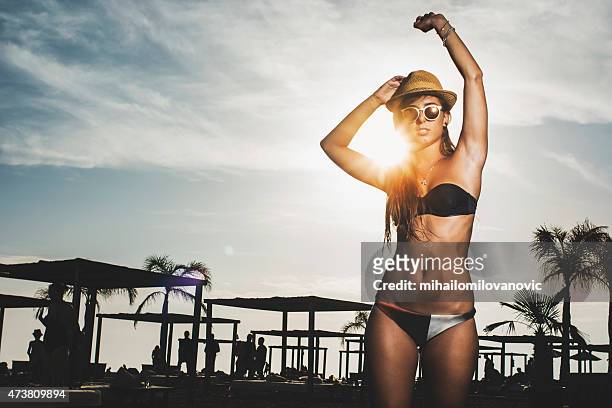 girl dancing at the beach - straw lips stock pictures, royalty-free photos & images