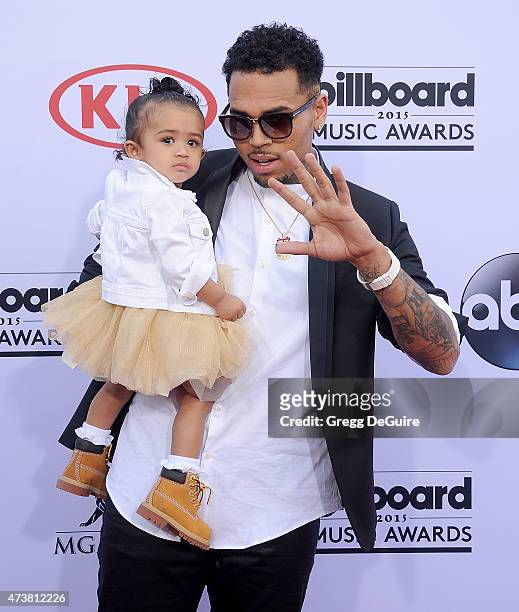 Singer Chris Brown and daughter Royalty arrive at the 2015 Billboard Music Awards at MGM Garden Arena on May 17, 2015 in Las Vegas, Nevada.