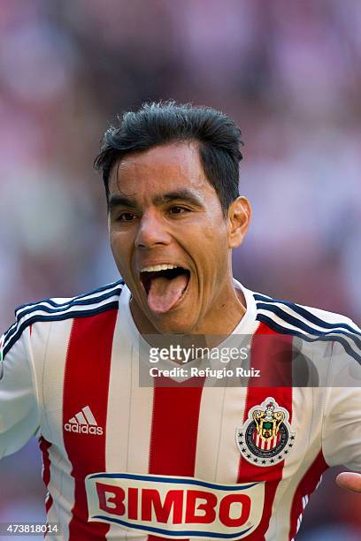 Omar Bravo of Chivas celebrates after scoring the fourth goal of his team during a quarterfinal second leg match between Atlas and Chivas as part of...