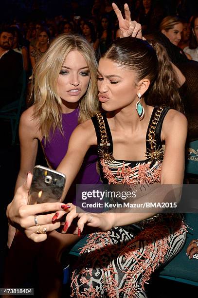 Model Martha Hunt and actress/singer Zendaya pose for a selfie photo at the 2015 Billboard Music Awards at MGM Grand Garden Arena on May 17, 2015 in...