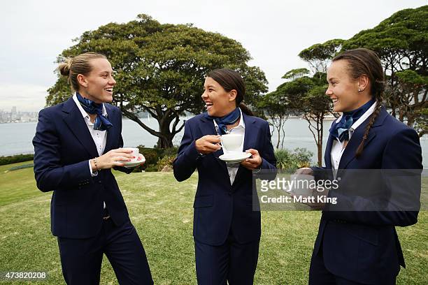 Australian Matildas players Emily van Egmond, Samantha Kerr and Caitlin Foord enjoy cups of tea during the Australian Matildas Governor-General...