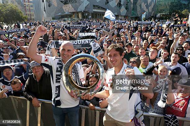Coach Kevin Muscat and Captain Mark Milligan with the ALeague trophy during the Melbourne Victory A-League Grand Final Celebrations at Federation...