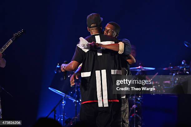 Jay-Z embraces Jay Electronica onstage during TIDAL X: Jay-Z B-sides in NYC on May 17, 2015 in New York City.