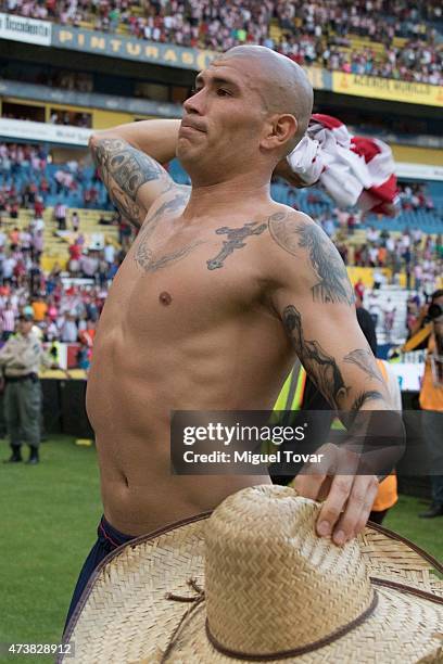 Jorge Enriquez of Chivas throws his jersey during a quarterfinal second leg match between Atlas and Chivas as part of Clausura 2015 Liga MX at...