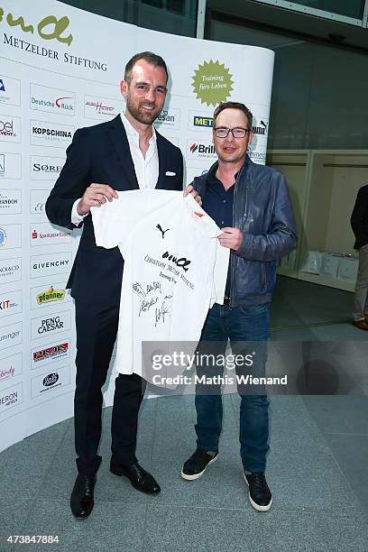 Matthias Opdenhoevel and Christoph Metzelder pose during the pre golf party of the 7th Golf Charity Cup hosted by the Christoph Metzelder Foundation...