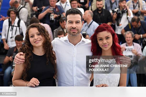 Mexican director David Pablos poses with Mexican actresses Nancy Talamantes and Leidi Gutierrez during a photocall for the film "Las Elegidas" at the...