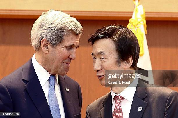 Secretary of State John Kerry talks with South Korean Foreign Minister Yun Byung-Se after a joint press conference at the Ministry of Foreign Affairs...